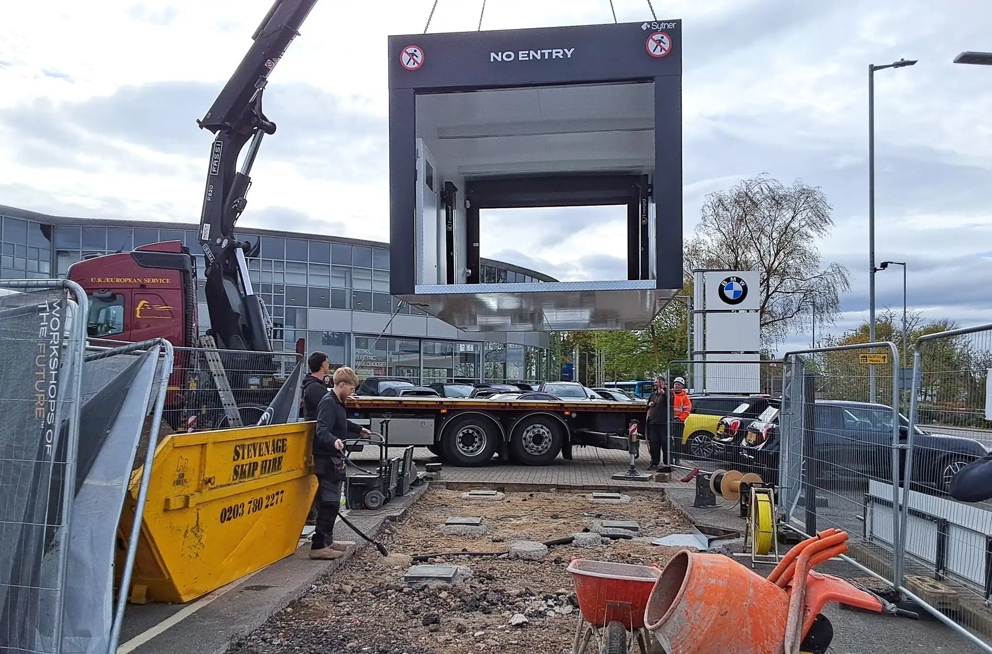 Drive-through inspection tunnel being lifted into place on site